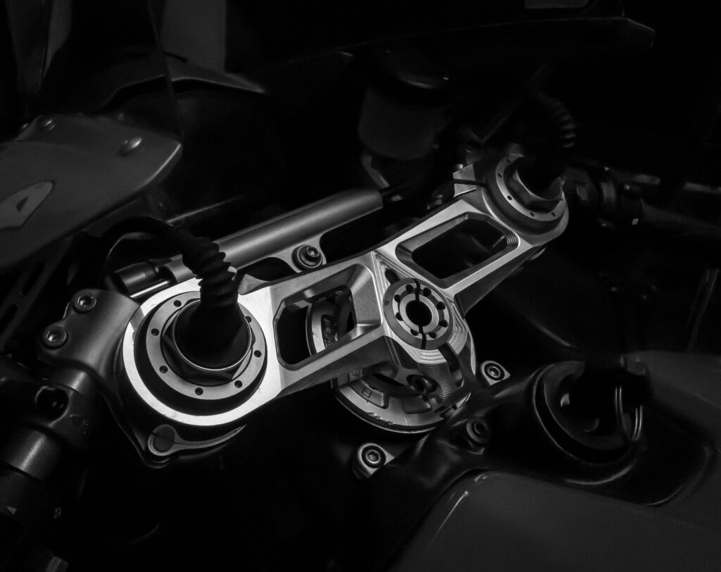 Confused between custom and market bike parts? Discover 7 real reasons why handcrafted parts last longer, perform better, and save money in India.